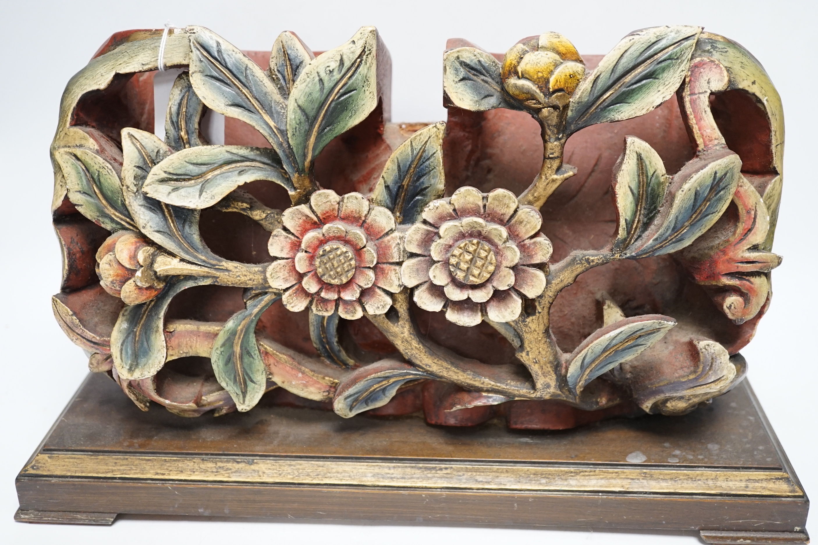 A Chinese floral wooden carving, 40cm wide, together with a Chinese cloisonné enamel vase and cover, 25cm tall, and a Chinese Yixing redware teapot